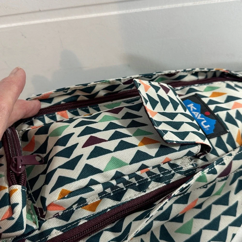 Kavu Geometric Triangle Sling Backpack in Cream, Black, Orange, Green, Navy